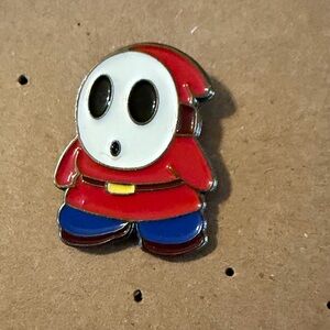 Red and Blue Shy Guy Enamel Pin